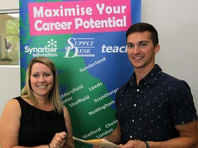 U of Windsor graduate Cole Parent, right, is heading to U.K. to teach with the help of Jessica Barkey, left, of Synarbor Education Friday August 14, 2015.  (NICK BRANCACCIO/The Windsor Star)