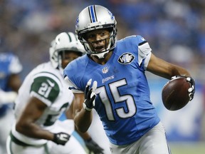 Detroit Lions wide receiver Golden Tate pulls ahead of New York Jets defensive back Marcus Gilchrist for a touchdown during the first half of an NFL preseason football game, Thursday, Aug. 13, 2015, in Detroit. (AP Photo/Rick Osentoski)