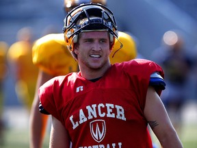 University of Windsor Lancers quarterback Casey Wright is back and has plenty of competition for starting quarterback position.  The Lancers were on the field at Alumni Field preparing for the 2015 OUA football season Monday August 17, 2015. (NICK BRANCACCIO/The Windsor Star)