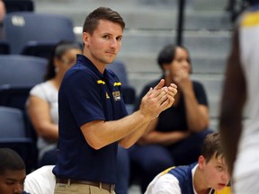 University of Windsor interim men's head basketball coach Ryan Steer during action vs University of Indianapolis at the St. Denis Centre on August 18, 2015 in Windsor, Ontario. (JASON KRYK/The Windsor Star)