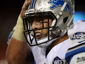 Zach Zenner #41 of the Detroit Lions looks on after scoring a touchdown during a preseason game against the Washington Redskins at FedEx Field on August 20, 2015 in Landover, Maryland.  (Photo by Matt Hazlett/Getty Images)