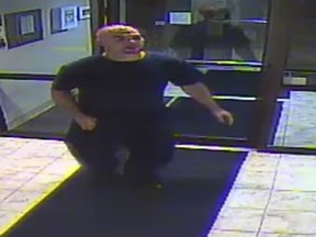 Windsor police have released a photo of a man they believe broke into an apartment building and damaged the coin-operated washing machines.