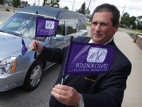 Leon M. Janisse at Windsor Chapel Funeral Home tells of a recent event where group of construction workers showed their respect for the deceased.  The workers stopped their machinery and removed their hardhats as the hearse and funeral procession passed by on Tecumseh Road East.  (NICK BRANCACCIO/The Windsor Star)