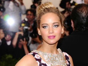 Jennifer Lawrence earned $52 million before taxes in the last 12 months. (The Associated Press files)