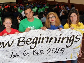 New Beginnings' Jobs For Youth graduates Taylor Hryniw, left, Jalyn Gaudette, Hayder Abdeljabar, Tayla Goulet and Amberelaine Bailey, right, are poster employees for the program as they celebrate at Teutonia Club August 21, 2015.   New Beginnings had 240 youth entered youth for full-time summer employment. (NICK BRANCACCIO/The Windsor Star)
