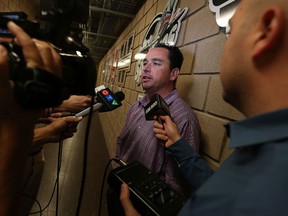 Bill Bowler talks with the media after it was announced he will be joining the Windsor Spitfires organization at the WFCU Centre in Windsor on Wednesday, August 26, 2015.                           (TYLER BROWNBRIDGE/The Windsor Star)