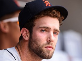 Daniel Norris #44 of the Detroit Tigers looks on from the dug out during a baseball game against the Baltimore Orioles at Oriole Park at Camden Yards on August 02, 2015 in Baltimore, Maryland.  (Photo by Mitchell Layton/Getty Images)