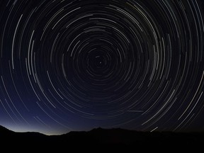 A multiple exposure file picture taken in the early hours of August 11, 2013 near La Hiruela, on the mountains of the Sierra Norte de Madrid, shows a Perseids meteor shower in the sky. Close to 100 shooting stars per hour will be visible from around the globe on a night sky, between August 12 and 13, 2015.  AFP PHOTO / DANI POZODANI POZO/AFP/Getty Images