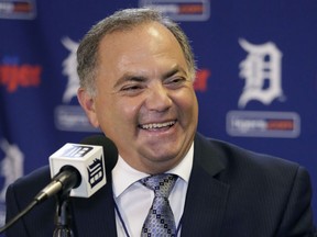 Al Avila laughs during a news conference at Comerica Park after he was promoted to executive vice president of baseball operations and general manager on August 4, 2015 in Detroit, Michigan. Avila replaces Dave Dombrowski who was the Tigers' general manager since 2002. (Photo by Duane Burleson/Getty Images)