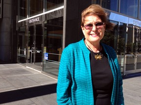 Vicki Saporta, president of the National Abortion Federation, poses for a photo outside of the federal courthouse in San Francisco, Monday, Aug. 3, 2015. A federal judge in San Francisco extended a restraining order on Monday that blocks an anti-abortion group from releasing any recordings that it secretly gathered at annual meetings of an abortion providers' association. (AP Photo/Lisa Leff)