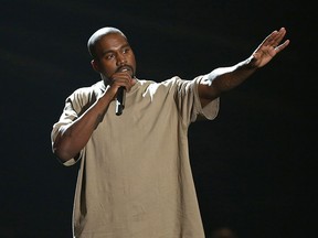 Kanye West accepts the video vanguard award at the MTV Video Music Awards at the Microsoft Theater on Sunday, Aug. 30, 2015, in Los Angeles. (Matt Sayles/Invision/AP)