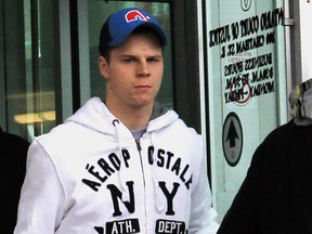 Former Windsor Spitfires player Ben Johnson leaves court on March 19, 2013 in Windsor, Ontario. (JASON KRYK/ The Windsor Star)