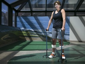 Beth Daly, a professor at the University of Windsor who was paralyzed from the waist down when she fell from her horse last year, is pictured at the Rehabilitation Institute of Michigan - Centre for Spinal Cord Injury Recovery in Detroit Michigan, Friday, August 21, 2015.   (DAX MELMER/The Windsor Star)
