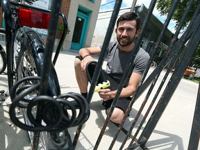 Oliver Swainson, from the City Cyclery in Windsor on Tuesday, August 11, 2015,  is one of the creators of a Facebook page dedicated to helping people find their stolen bikes.                         (TYLER BROWNBRIDGE/The Windsor Star)