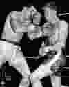 Lightweight Champion Mark Adams, left, Windsor challenger Brad Jeffries exchange blows on March 19, 1988. (Nick Brancaccio/Windsor Star)