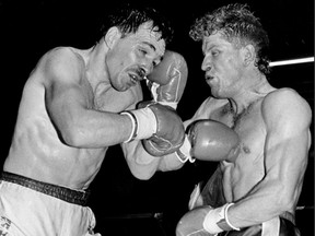 Lightweight Champion Mark Adams, left, Windsor challenger Brad Jeffries exchange blows on March 19, 1988.  (Nick Brancaccio/Windsor Star)