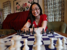 Rachel Tao is preparing for a trip to Mongolia where she will compete in a worldwide chess championship. She is shown at her Windsor, ON. home on Friday, August 14, 2015. (DAN JANISSE/The Windsor Star)