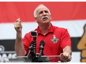 CHICAGO, IL - JUNE 18:  Head coach Joel Quenneville of the Chicago Blackhawks speaks to the crowd during the Chicago Blackhawks Stanley Cup Championship Rally at Soldier Field on June 18, 2015 in Chicago, Illinois.
