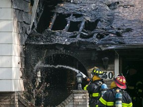 Windsor fire crews put out a blaze at 9830 Osborne Cres. on Saturday, August 29, 2015. (DAX MELMER/The Windsor Star)