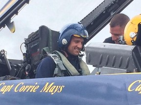 Detroit Red Wings forward Luke Glendening grins as he prepares to ride along in an F/A-18 Hornet with the U.S. Navy Blue Angels Wednesday at Willow Run Airport in Ypsilanti, Mich.