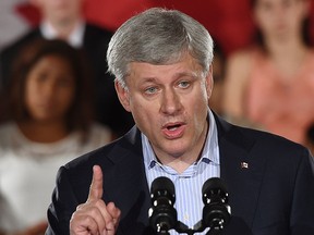 In this file photo, Conservative leader Stephen Harper makes a campaign  stop in Newmarket , Ontario, on Thursday, August 20, 2015.  THE CANADIAN PRESS/Sean Kilpatrick