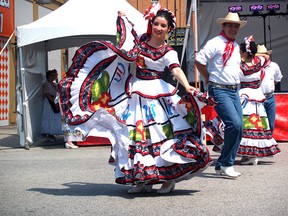 Christina Navarro dances with the Ballet Mexicano de Montreal during Fiesta Latina in downtown Windsor on Sunday, August 16, 2015. The traditional Mexican dancing troupe performed two shows over the weekend.                     (ALEX BROCKMAN/The Windsor Star)