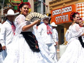 Andrea Borja (centre) dances with the Ballet Mexicano de Montreal during Fiesta Latina in downtown Windsor on Sunday, August 16, 2015. The traditional Mexican dancing troupe performed two shows over the weekend.                  (ALEX BROCKMAN/The Windsor Star)