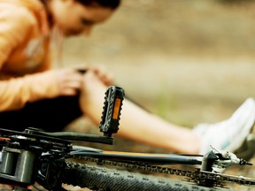 Wounded woman fell from bicycle. Photo by fotolia.com