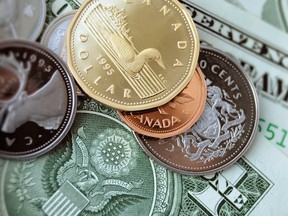 U.S. dollar and Canadian dollar. Photo by fotolia.com