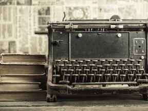 Photo of classic typewriter and books by fotolia.com