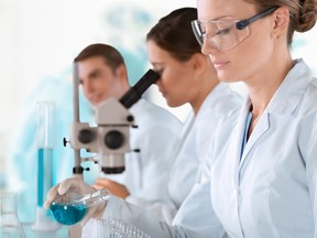 Working in a laboratory. Photo by fotolia.com