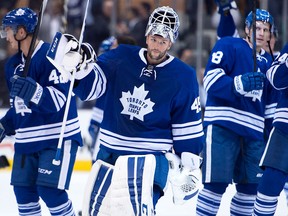 Toronto Maple Leafs goaltender Jonathan Bernier salutes the crowd after a 4-0 win over the Buffalo Sabres in NHL action in Toronto on Tuesday October 28, 2014. THE CANADIAN PRESS/Frank Gunn