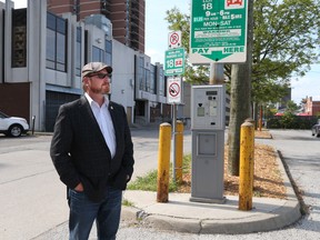 WINDSOR, ONTARIO - AUGUST 7, 2015 - City of Windsor councillor Chris Holt stands at the city-owned pay-and-display lot behind the downtown Windsor Public Library in Windsor, Ont. (JASON KRYK/The Windsor Star)