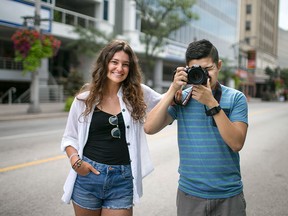 Creators of the blog, Humans of Windsor, Alesandra Collavino, 21, left, and John Lam, 22, are pictured in downtown Windsor, Sunday, August 30, 2015. (DAX MELMER/The Windsor Star)