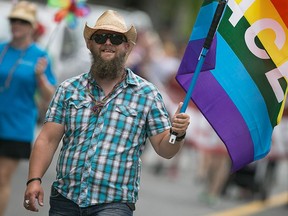 Jeff Coombs takes part in the Windsor Essex Pride Fest parade on Ouellette Ave., Sunday, August 9, 2015.     (DAX MELMER/The Windsor Star)