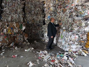 Councillor Ed Sleiman takes a tour of the Recycling Makes Cents facility in Windsor on Thursday, Aug. 6, 2015. The facility is looking to expand their operation.                          (TYLER BROWNBRIDGE/The Windsor Star)