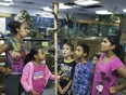 Day campers at the Canada South Science City get a close up look at a corn snake, Friday, August 28, 2015.  The science facility is in search of a new home after using their current building at 930 Marion Ave. for 11 years.  (DAX MELMER/The Windsor Star)