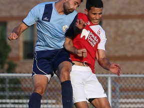 Windsor Ciociaro's Christopher Hakim (L) and Windsor Croatia's Marwan Helal battle for the ball during a game Wednesday, August 5, 2015, at the McHugh Park in the Essex County Soccer Association cup final. (DAN JANISSE/The Windsor Star)