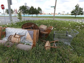 Couches and other large garbage items, as shown on Aug. 5, 2015, are a common site in Windsor. Getting them properly disposed of is the responsibility of property owners.                        (TYLER BROWNBRIDGE/The Windsor Star)