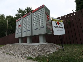 One of the new mailboxes which has come under fire is seen in Tecumseh on Tuesday. The platform sits several inches above ground level, making it difficult for some to reach. (TYLER BROWNBRIDGE / The Windsor Star)