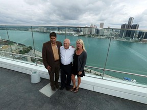Ram Sridhar, left, Mike Kelly and Kelly Steele stand high above Windsor during a kickoff event for the Easter Seals Drop Zone event at Caesars Windsor on Aug. 25, 2015.                  (TYLER BROWNBRIDGE/The Windsor Star)