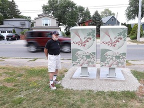 WINDSOR, ONTARIO - AUGUST 17, 2015 - Riverside Drive resident Paul Murray stands next to a new Canada Post mailbox in the 11000 block of Riverside Drive east in Windsor, Ontario on August 17, 2015.  (JASON KRYK/The Windsor Star)  (SEE STORY ON RESIDENTS UPSET WITH THE LOCATION OF THE MAILBOX FOR SAFETY REASONS)