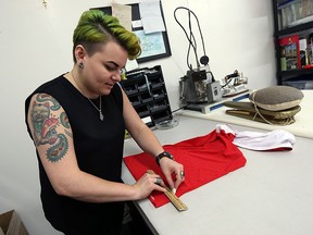 Marie Glas makes alterations to some workout clothes at Aardvark Tailoring in Windsor recently. (TYLER BROWNBRIDGE / The Windsor Star)