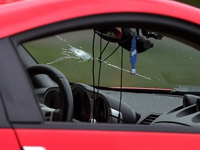 Windsor police investigate after a man driving a Nissan 350Z escaped serious injury after gunshots were fired in his direction, one hitting the front wind shield, on Sept. 9, 2015.  (NICK BRANCACCIO/The Windsor Star)