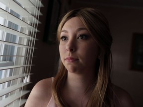 Kyra Roberts is photographed in her Windsor home on Tuesday, Sept. 8, 2015. Roberts is battling ovarian cancer. (TYLER BROWNBRIDGE/The Windsor Star)