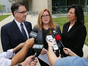 Local NDP candidates Brian Masse (Windsor West), left, Tracey Ramsey (Essex)  and Cheryl Hardcastle (Windsor-Tecumseh) are shown at a media conference on Wednesday, Sept. 9, 2015, at the University of Windsor that focused on the party's auto strategy. (DAN JANISSE/The Windsor Star)