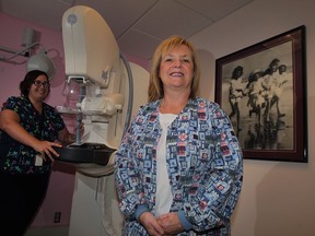 Breast cancer success story Jody Huot wants to spread the word about early detection of breast cancer, Thursday September 10, 2015.  Mammography technologist Amanda MacMillan, left, looks on at the Breast Health Centre Windsor Regional Hospital Met Campus. (NICK BRANCACCIO/The Windsor Star)