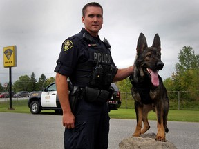 OPP Constable Dan Harness with K9 member Valor at Essex Detachment on Manning Road Friday Sept. 11, 2015. (NICK BRANCACCIO/The Windsor Star)