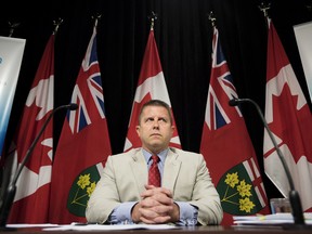 Ontario Ombudsman Andre Marin prepares to speak to reporters about the release of his annual report at Queen's Park in Toronto on Tuesday, July 28, 2015. THE CANADIAN PRESS/Darren Calabrese