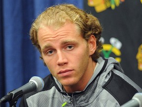 Chicago Blackhawks' Patrick Kane listens during a media availability on the first day of NHL hockey training camp at the Compton Family Ice Center on the campus of the University of Notre Dame in South Bend, Ind., Thursday Sept. 17, 2015 (AP Photo/Joe Raymond)